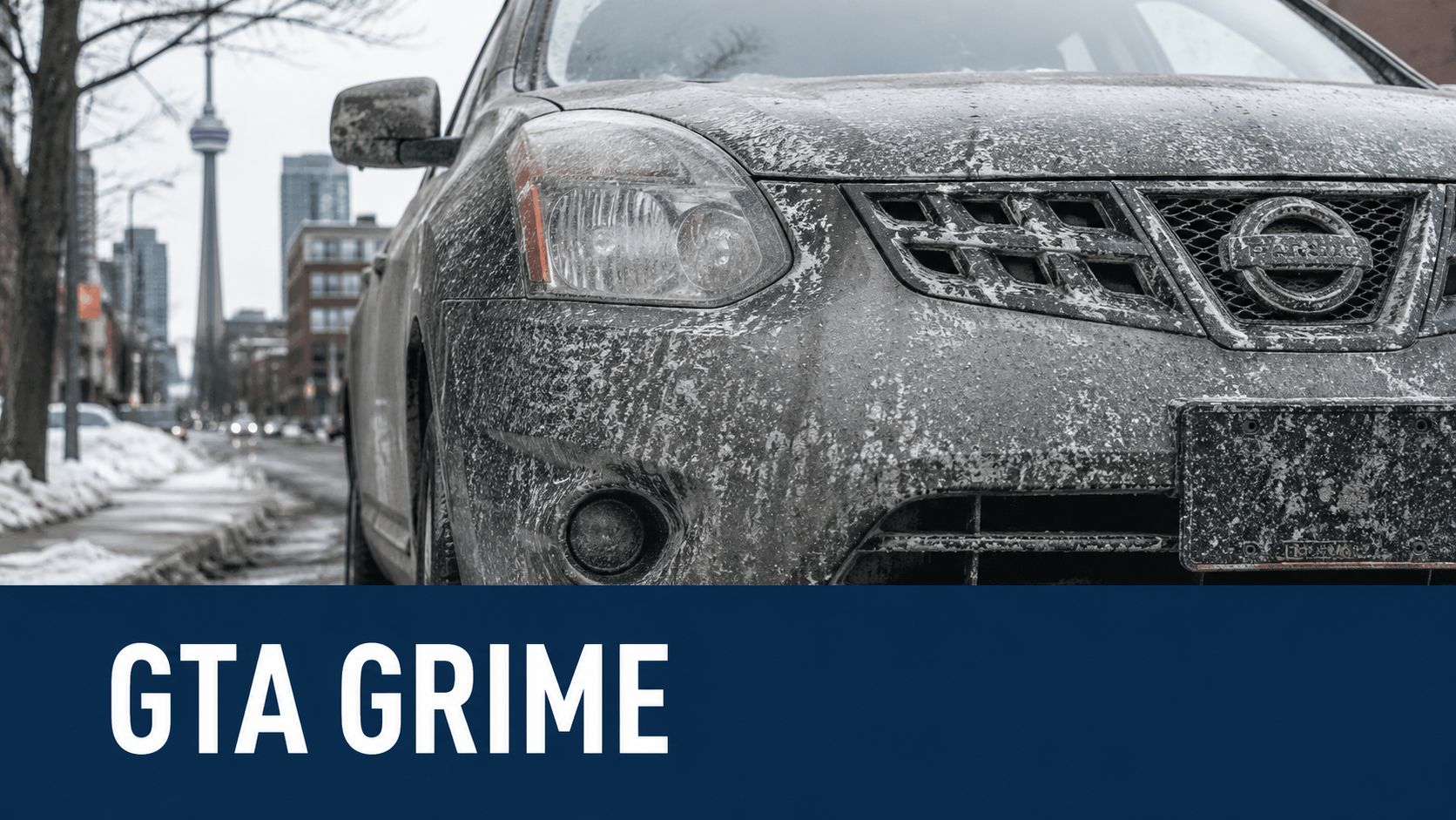 A dirty Nissan car covered in road salt and grime, parked on a winter city street.